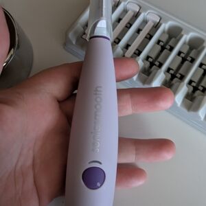 Purple Sonic Facial Device